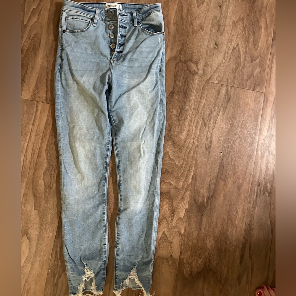 Front button up skinny jeans
